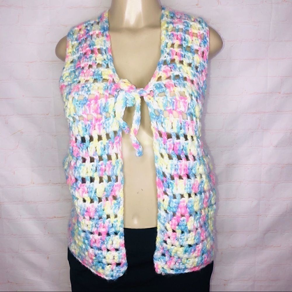 Crochet vest with pink yellow and green